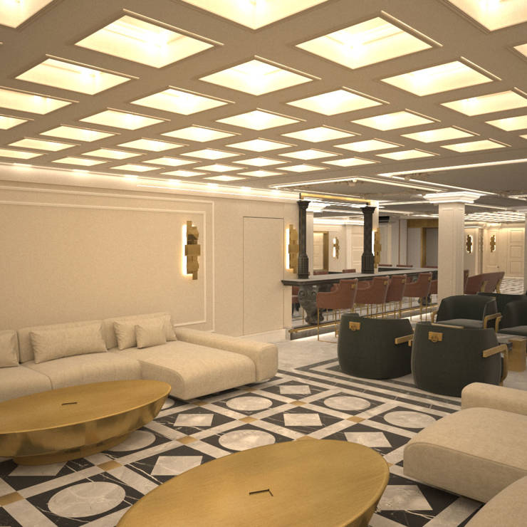 Elegant hotel lobby with soft beige sofas, golden tables, and warm illuminated ceiling panels in Royal Marmin Arachova