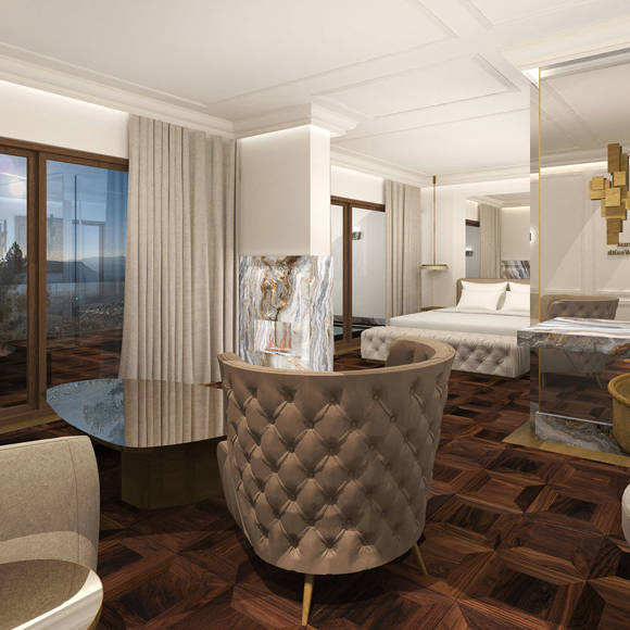 Elegant open-plan Presidential Blue Suite featuring a marble fireplace, push seating area, and panoramic mountain view