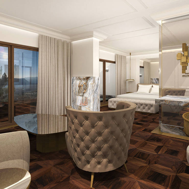 Elegant open-plan Presidential Blue Suite featuring a marble fireplace, push seating area, and panoramic mountain view