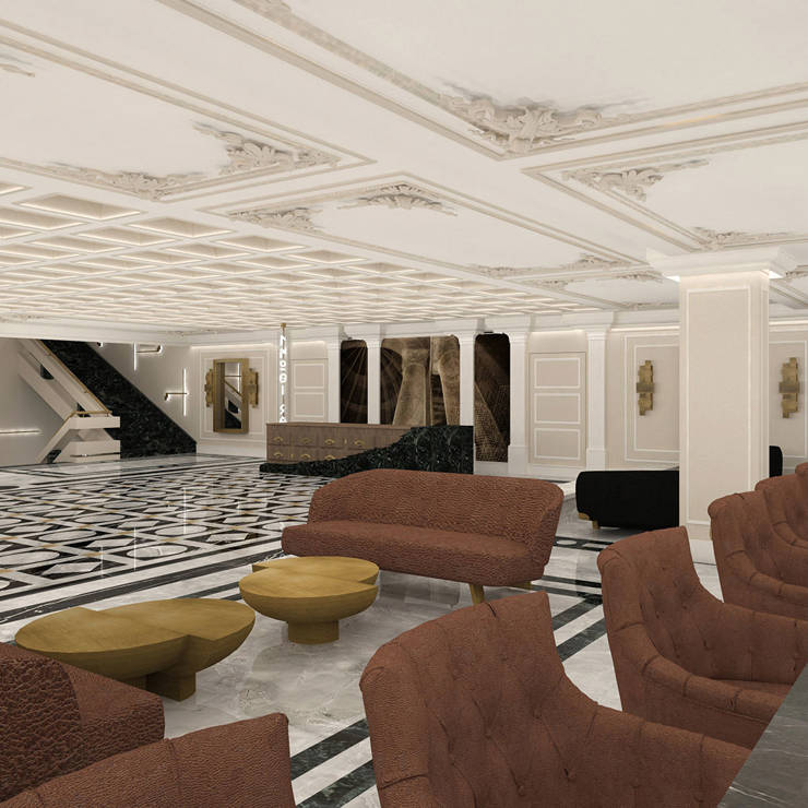 Luxurious hotel lobby with marble flooring, ornate ceiling details, and elegant seating by the reception