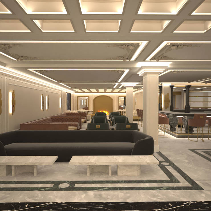 Luxurious hotel lobby with marble floors, gold accents, and elegant lounge seating centered around a glowing fireplace