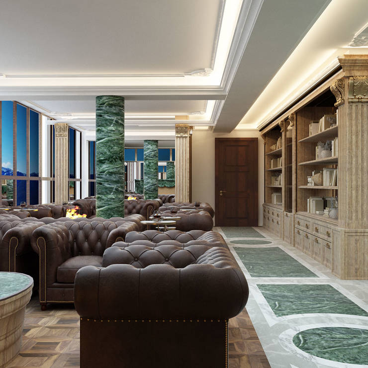 Luxurious cigar room with marble columns, leather seating, and large windows overlooking the mountains