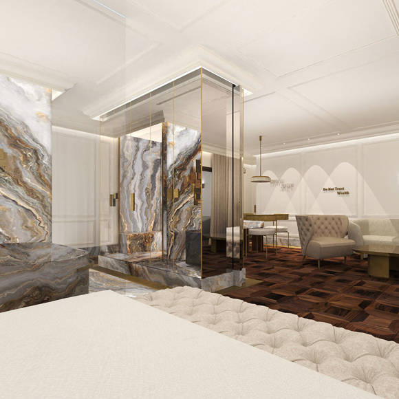 Luxurious Presidential Blue Suite with marble design, glass shower, and fireplace for an elegant mountain retreat