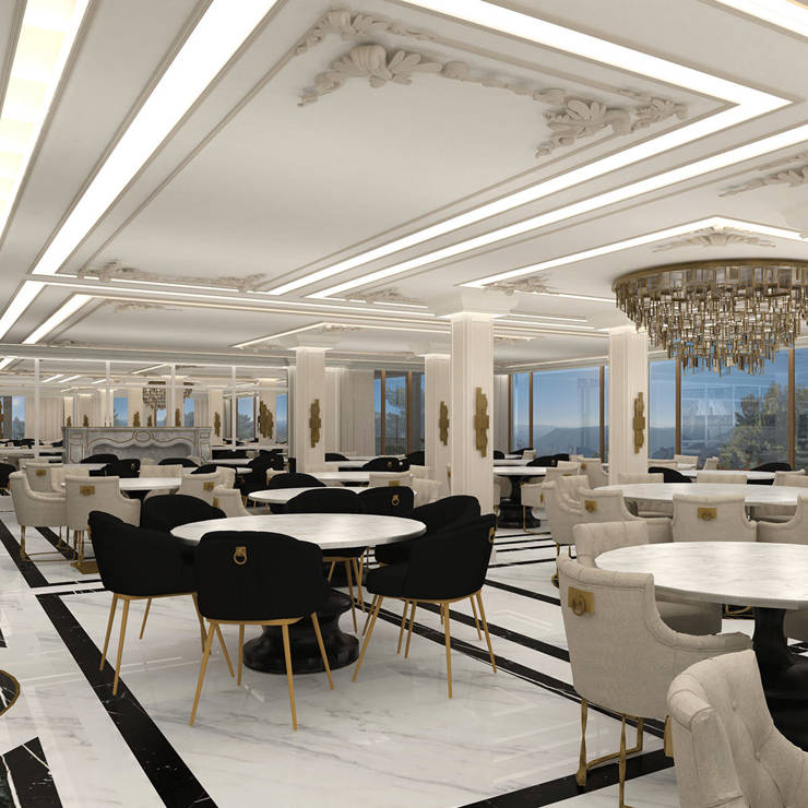 Interior of the Royal Mamin Arachova's restaurant with golden accents and windows with mountain views