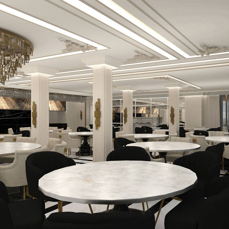 Luxurious restaurant in Royal Marmin Arachova with marble walls, golden chandelier and accents, and round tables