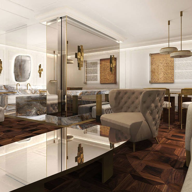 Elegant living area with marble finishes, gold lighting fixtures, and plush seating in Presidential Blue Suite